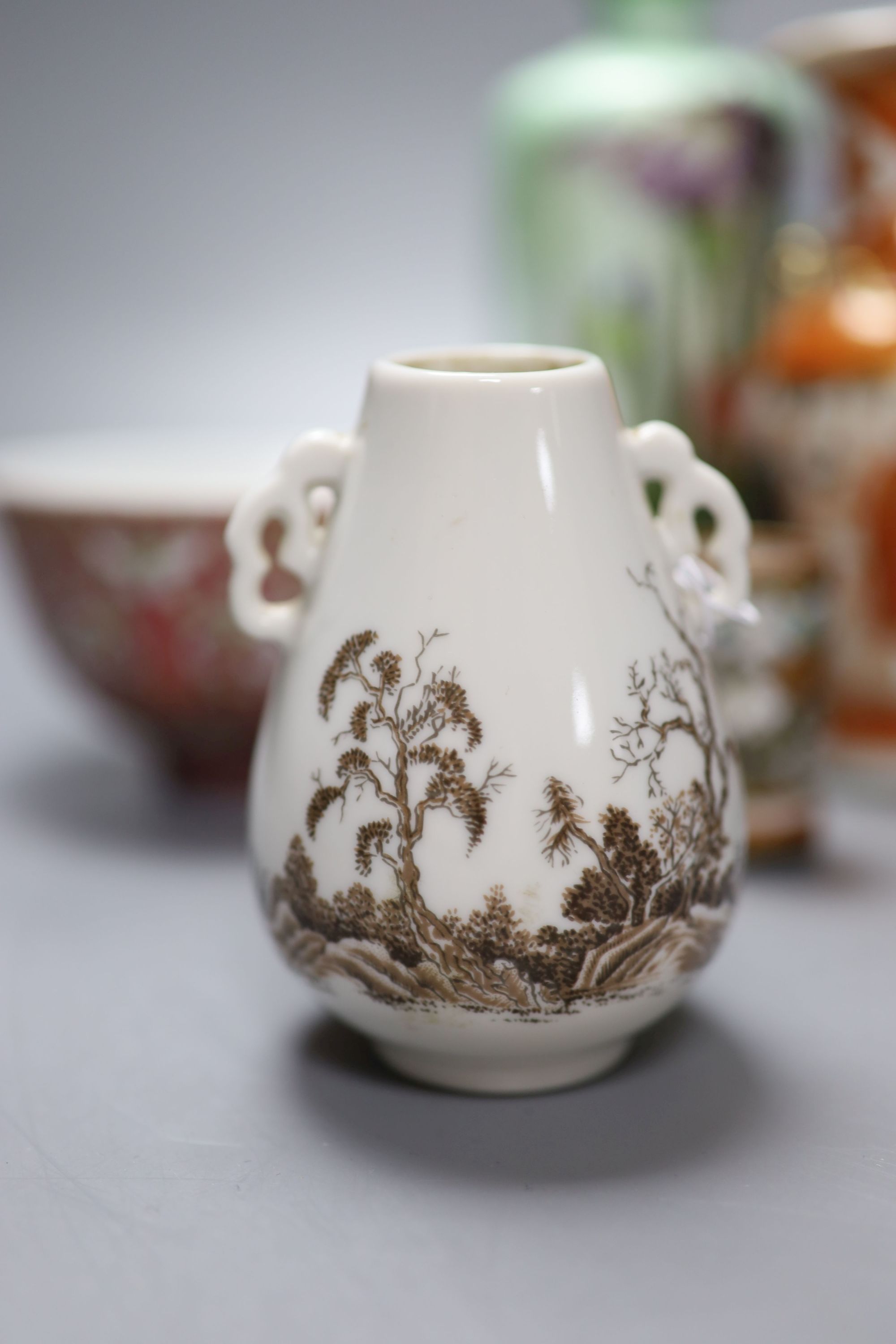 A group of Chinese and Japanese ceramics and three cloisonne enamel vases